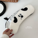 Black and white checkered toilet seat cushion