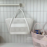 Pink mesh handbag