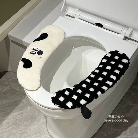 Black and white checkered toilet seat cushion