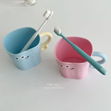 Smiling face cup