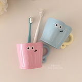 Smiling face cup