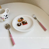 Red and white checkered tableware set