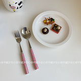 Red and white checkered tableware set