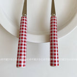 Red and white checkered tableware set