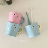 Smiling face cup