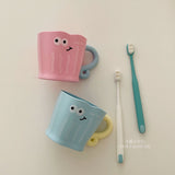 Smiling face cup