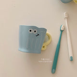 Smiling face cup