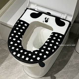 Black and white checkered toilet seat cushion